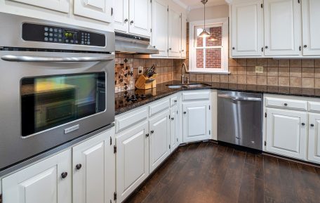 Freshly painted white kitchen cabinets