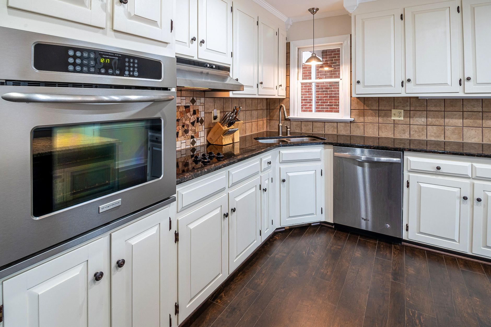 Freshly painted white kitchen cabinets